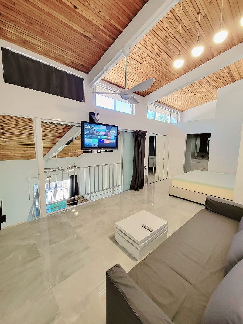 Main room upstairs open sliding panels and curtain