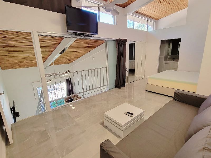 Main room upstairs open sliding panels and curtain