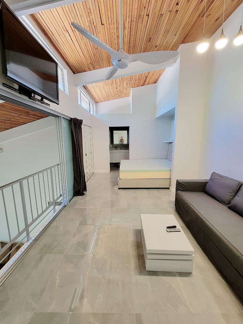 Main room upstairs open sliding panels and curtain