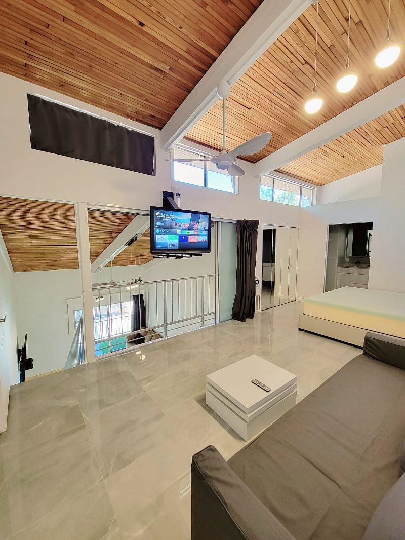 Main room upstairs open sliding panels and curtain