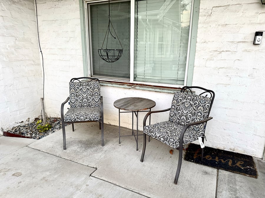 Sitting area in front of apartment.