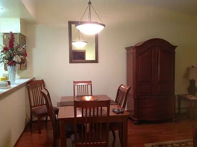 Dining room table and chairs, armoire with TV and DVR