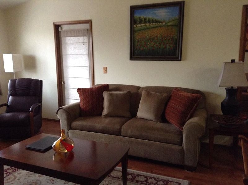 Livingroom showing the door leading out to the private deck