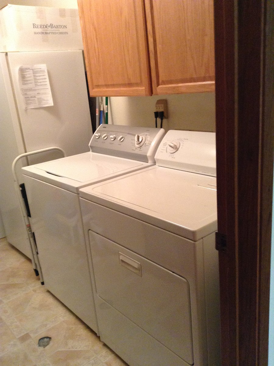 Full Size Washer and Dryer and Freezer in Storage Rm
