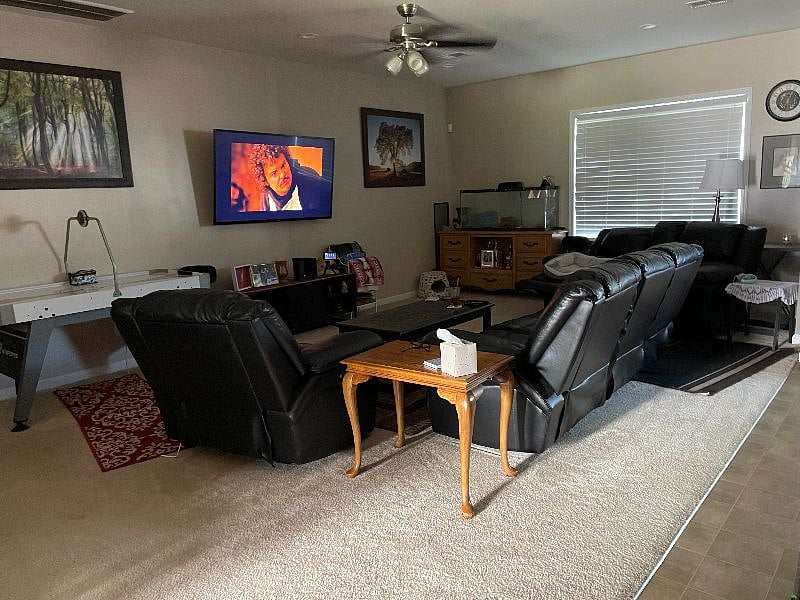 Living room with an air hockey table!!