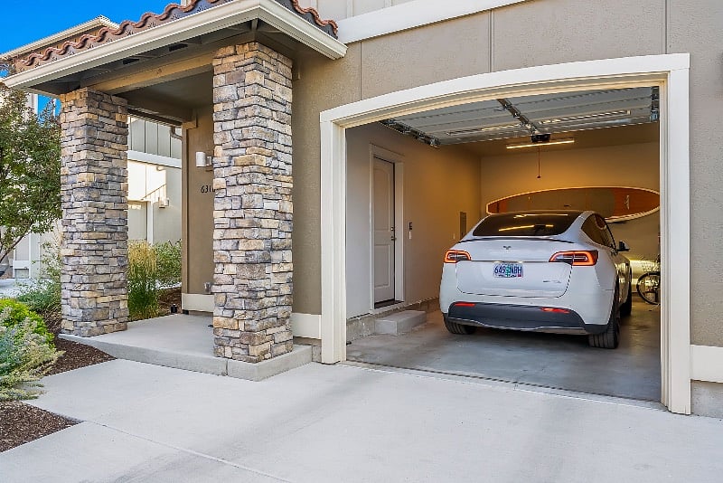 One car garage, door to townhouse in garage.