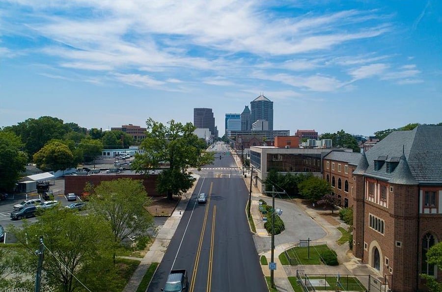 Fisher Park on left , church across street and downtown Greensboro straight ahead in view