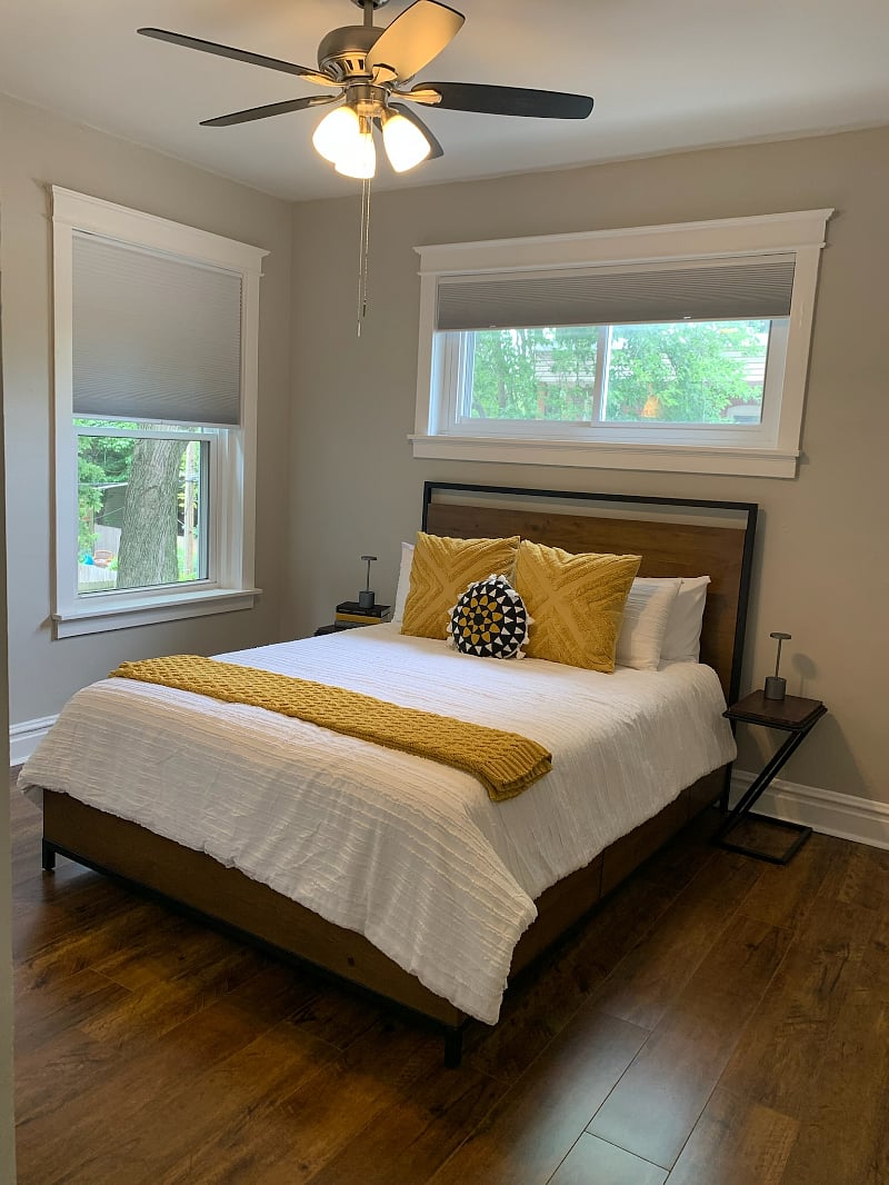 Queen bedroom with black out cellular shades.