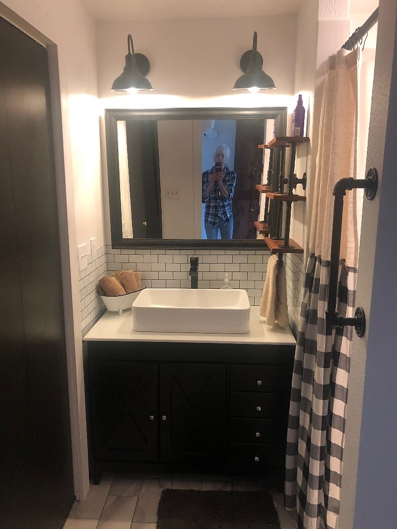 Bathroom with washer and dryer on main floor.