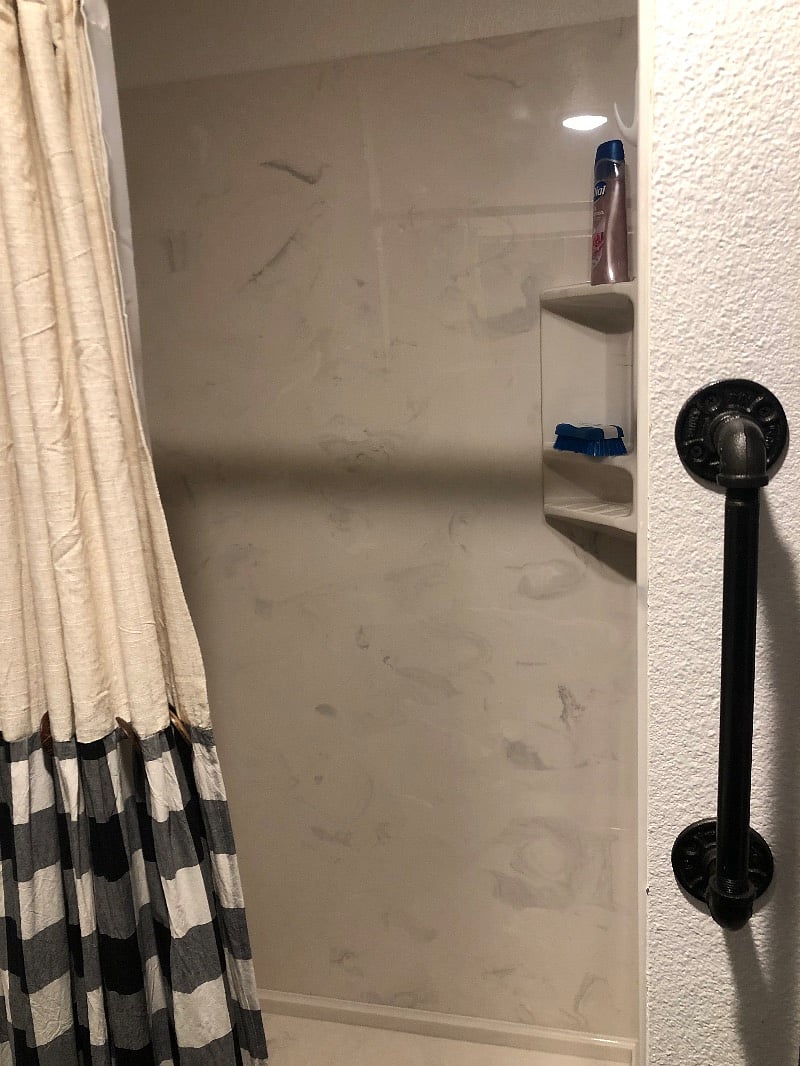 Large marble walk-in shower.