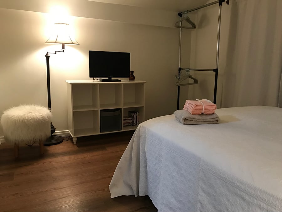 Bedroom two with hangers and cube storage