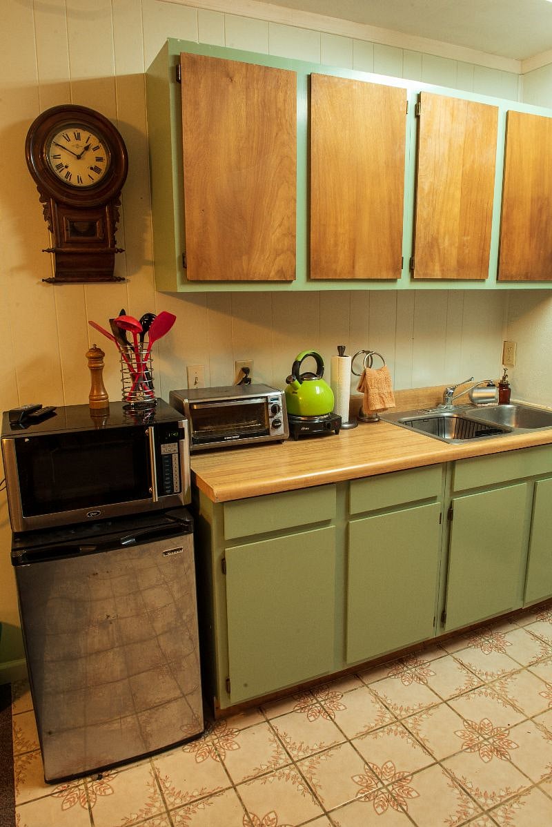 Refrigerator has been upgraded to larger one with separate freezer.
