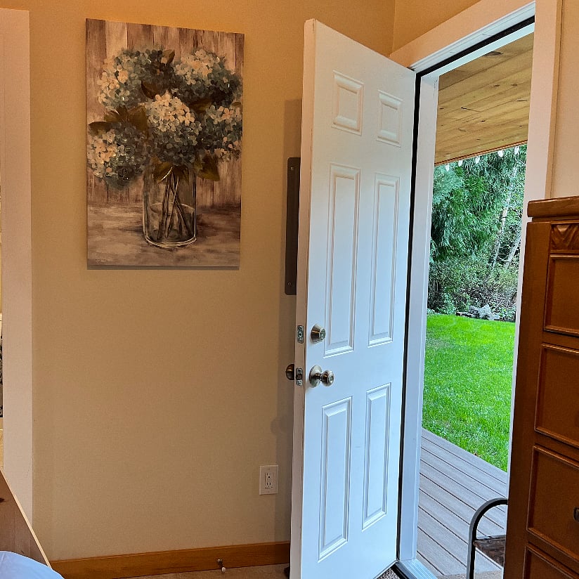 Door at bedroom and sliding glass door at living space are in and out points.