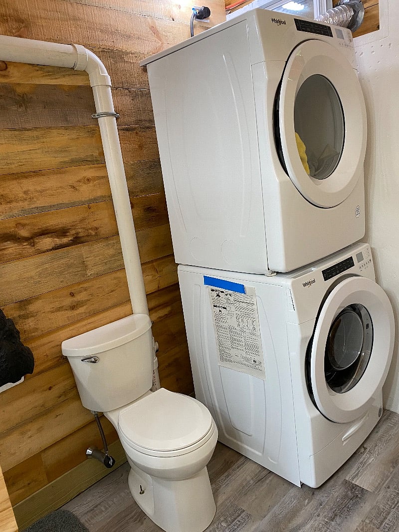 Bathroom with washer and dryer in walkin basement 