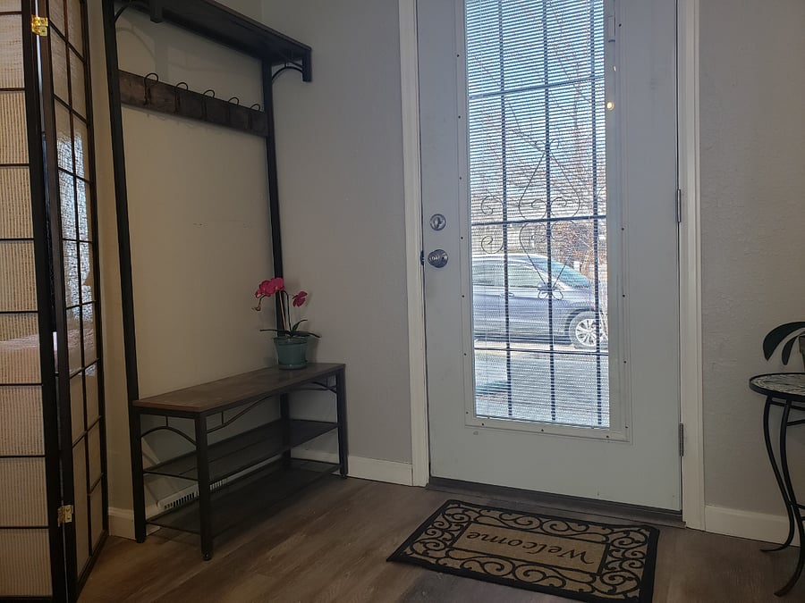 Private entrance and coat rack