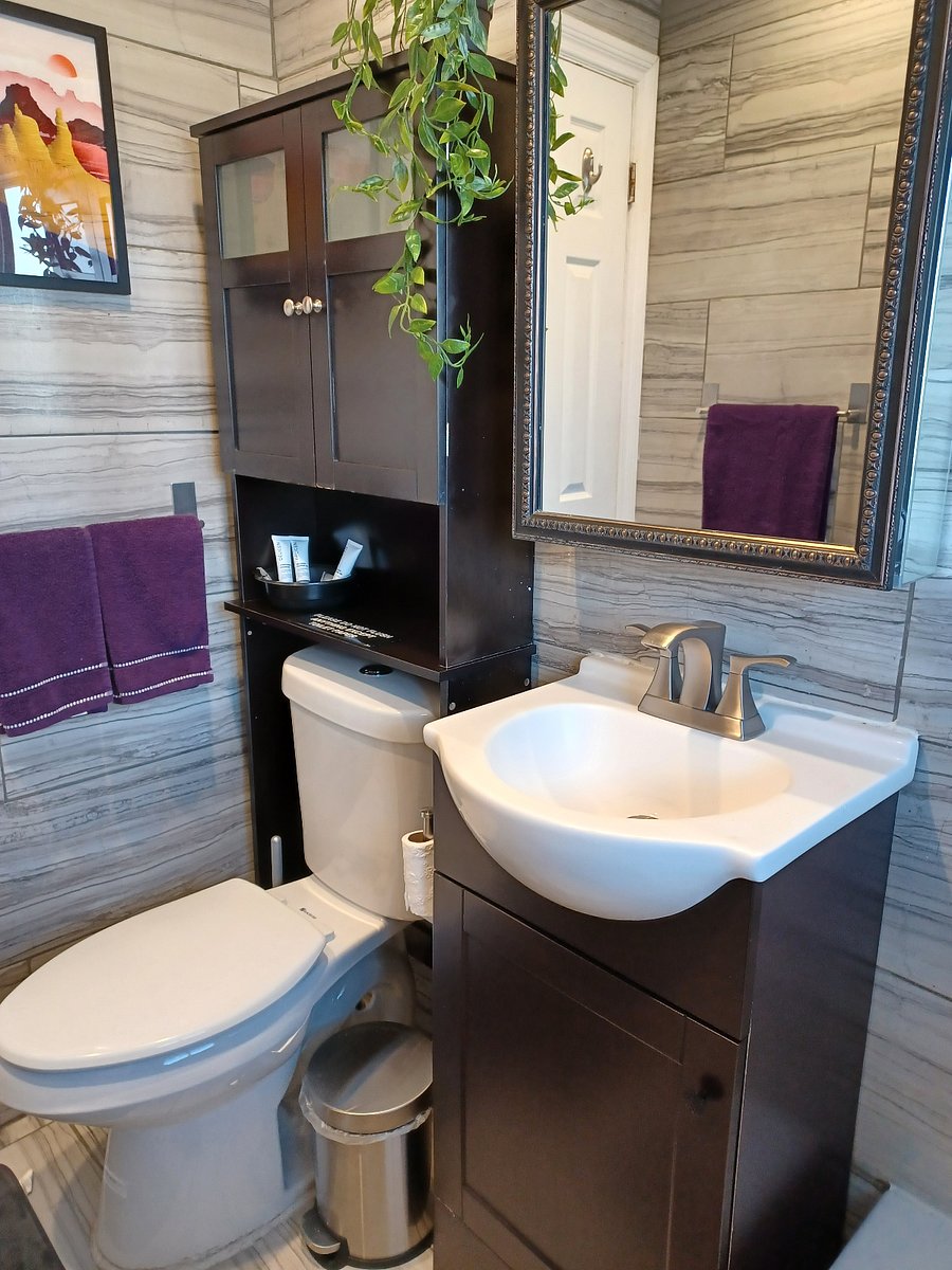 Full bathroom vanity and toilet