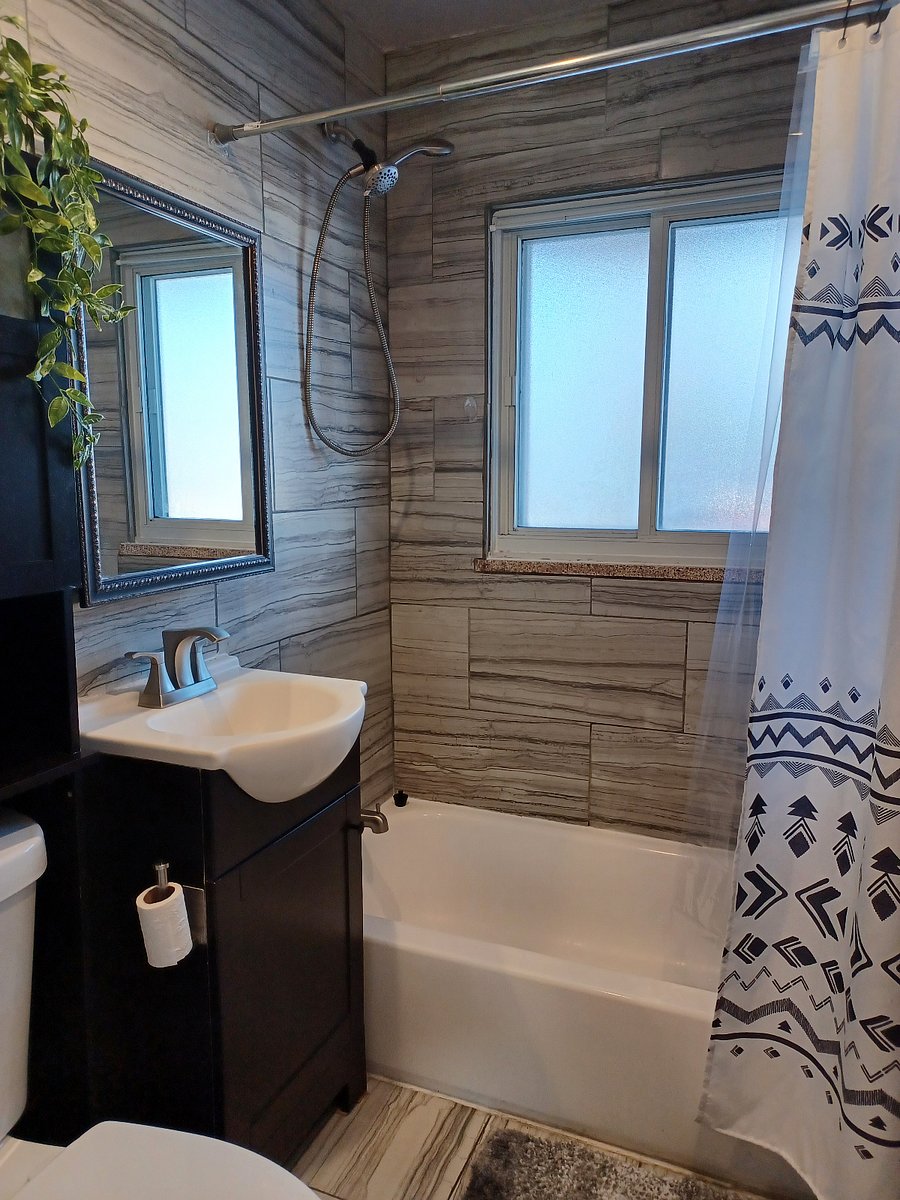 Full bathroom with tub