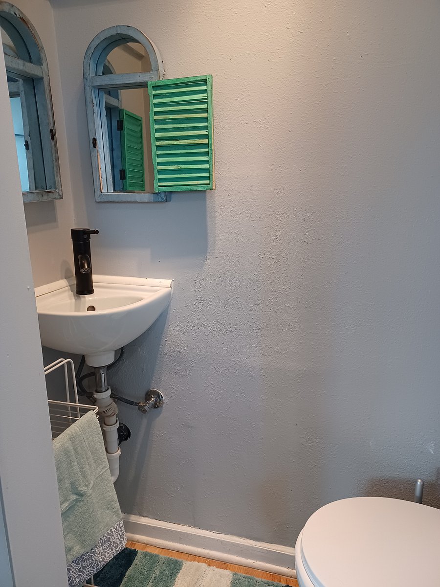 Half bath with toilet and sink