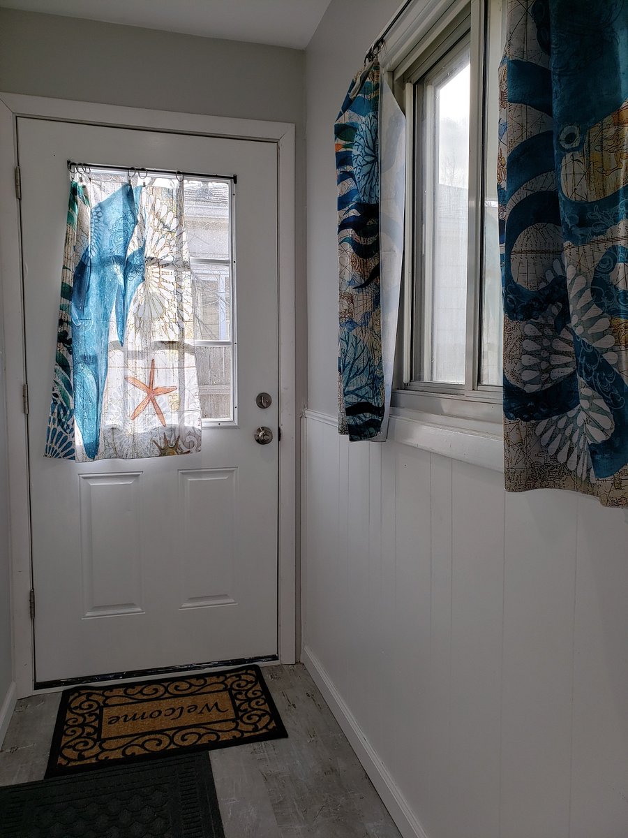 Entry door with coat hooks and space for boots