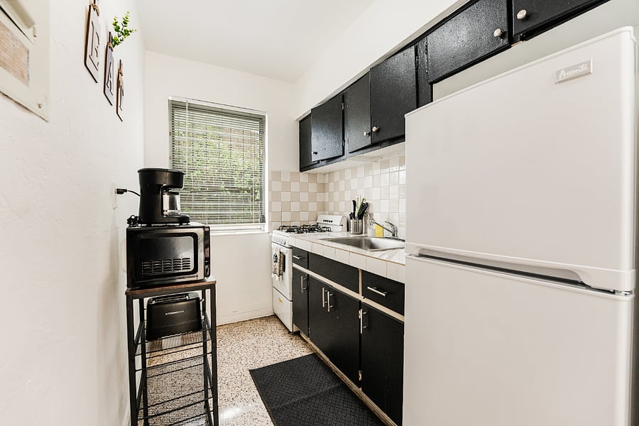 Warm and inviting kitchen space, perfect for everyday cooking or takeout nights.