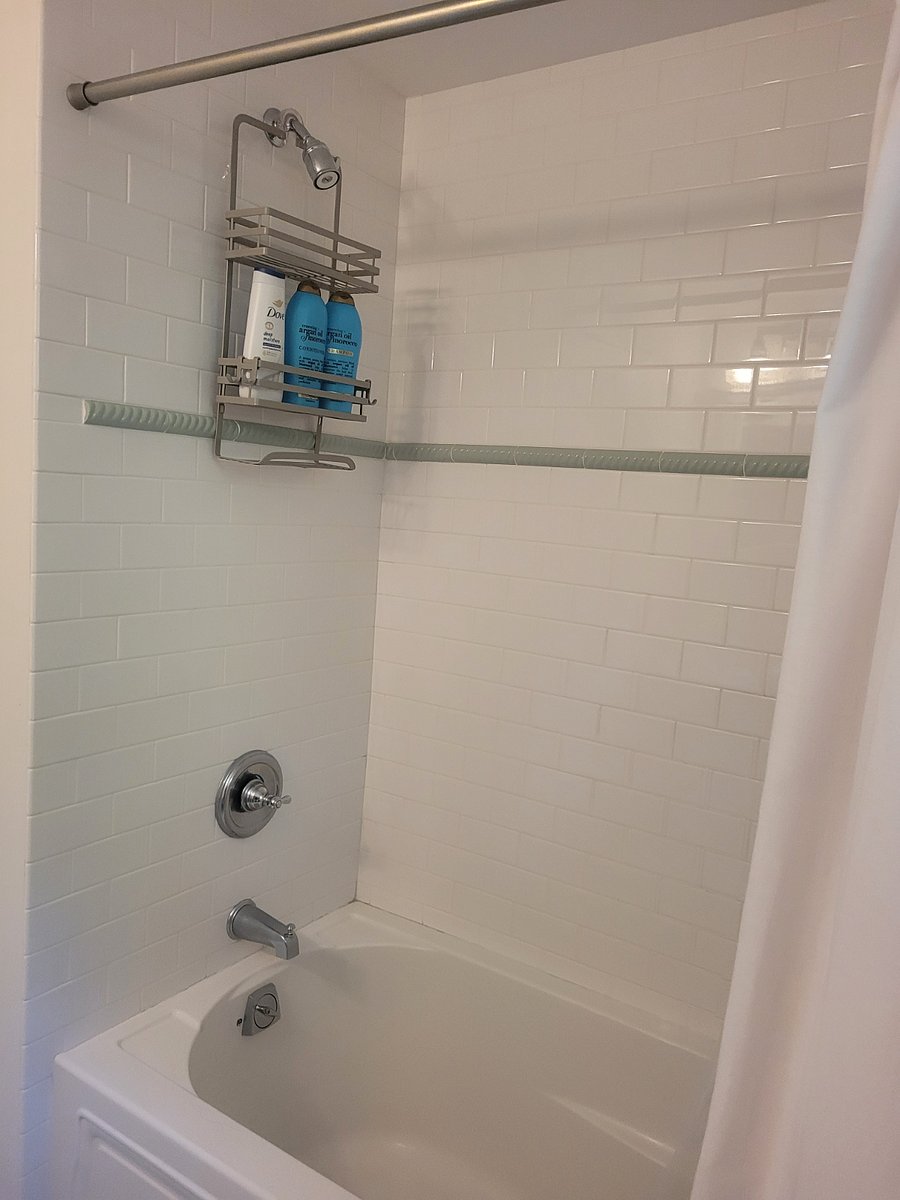 Full bathroom with tub.