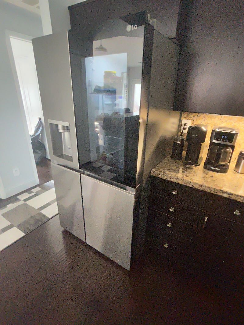 Kitchen with new appliances and two coffee makers including Nespresso