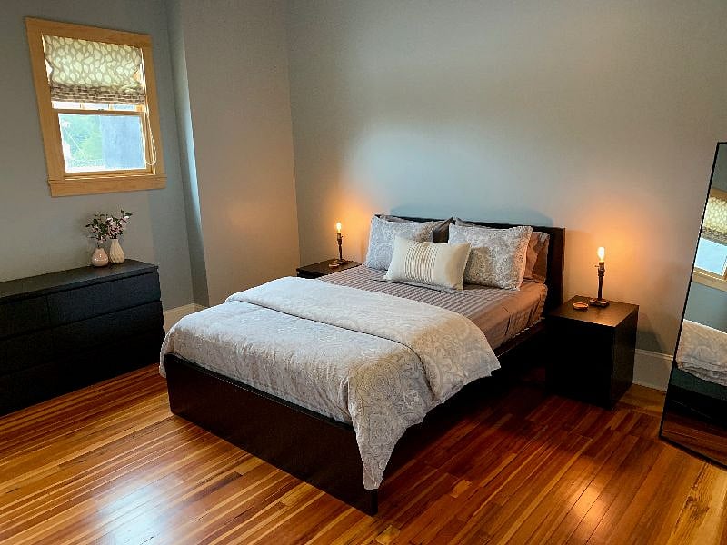 Primary with private bath and walk in closet with washer/dryer.