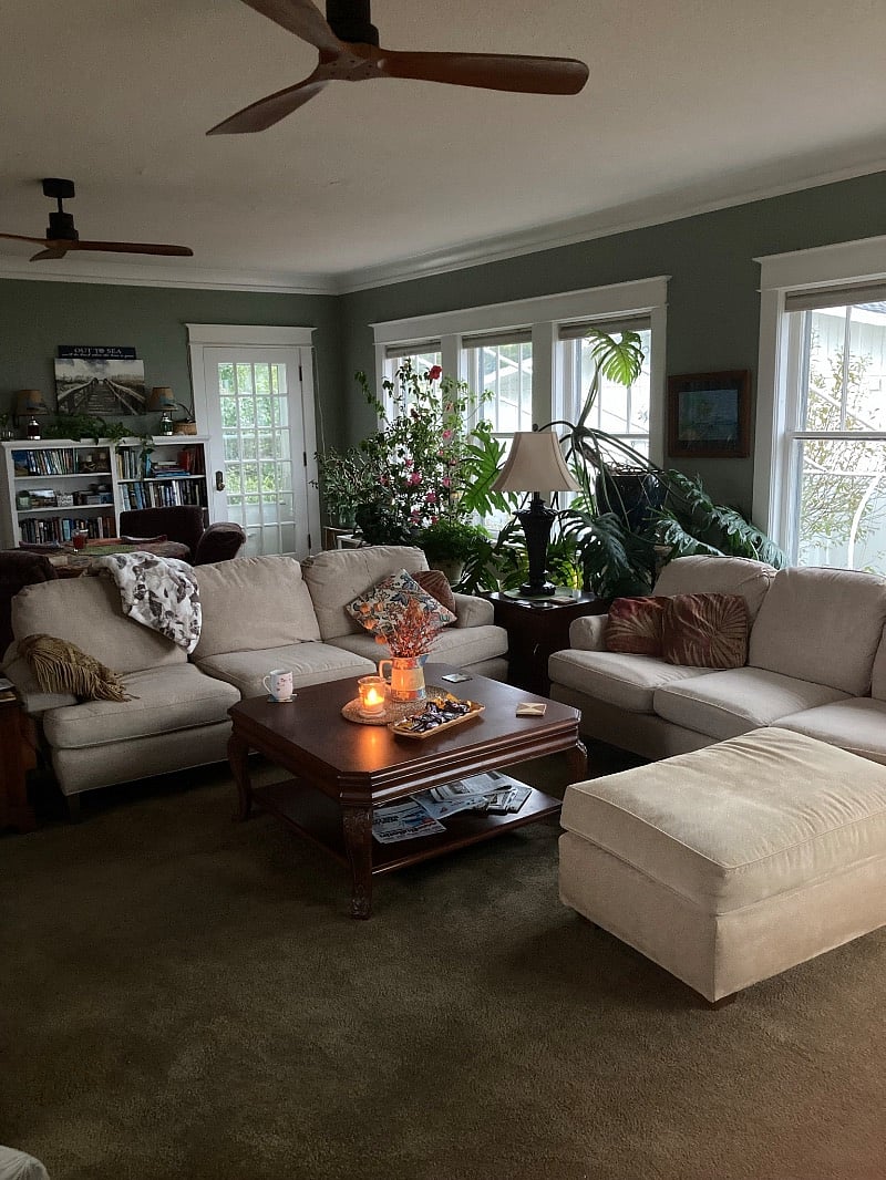 Comfortable family has more windows than walls with a beautiful view of Muskegon Lake and a fireplace.