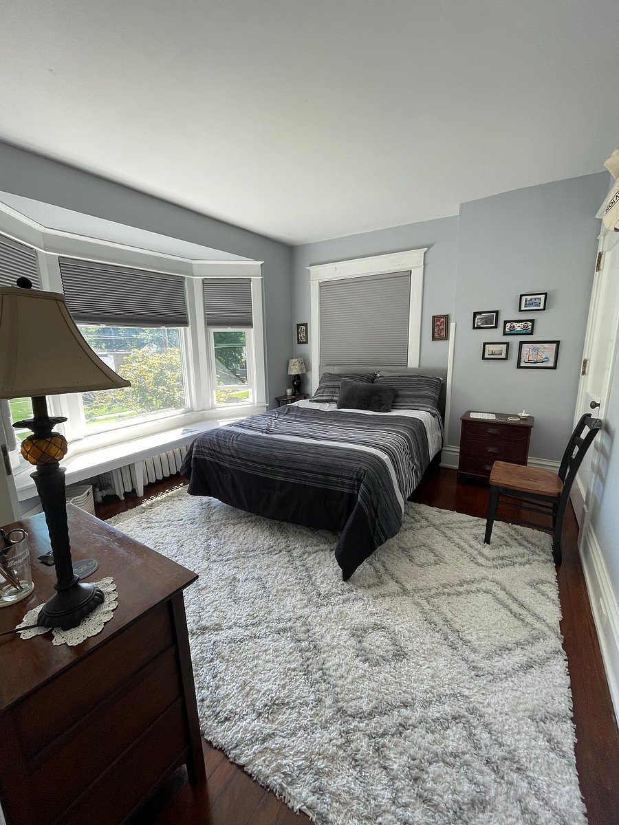 Travelers bedroom with queen bed and blackout shades connects directly to the Jack and Jill bathroom.