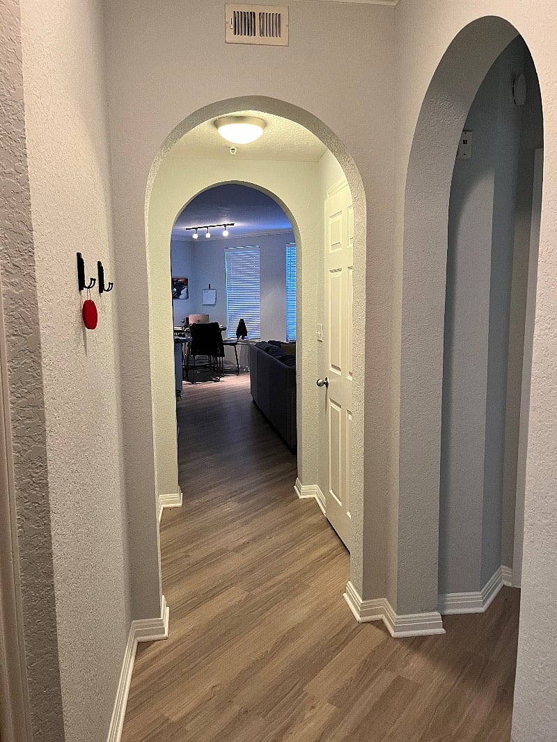 Entrance view to condo. First guest bathroom and bedroom
On the right.