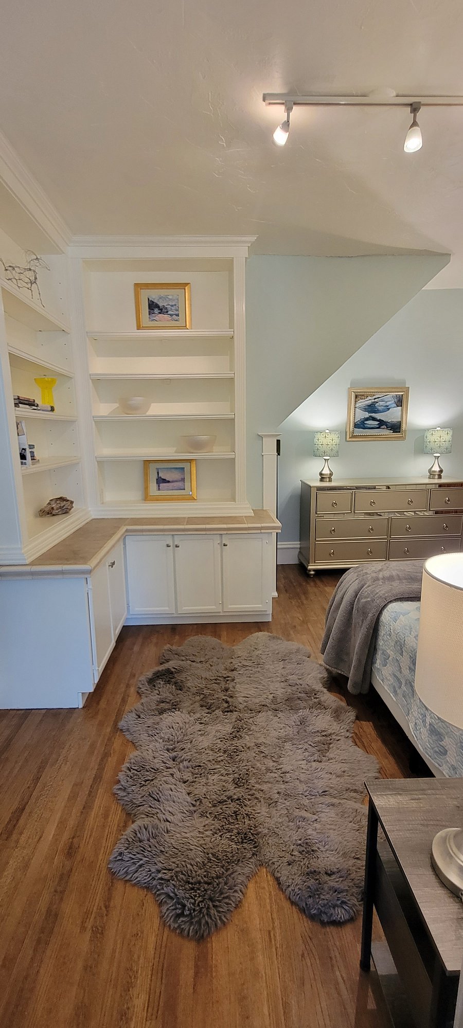 Built in shelves and cupboards add plenty of storage