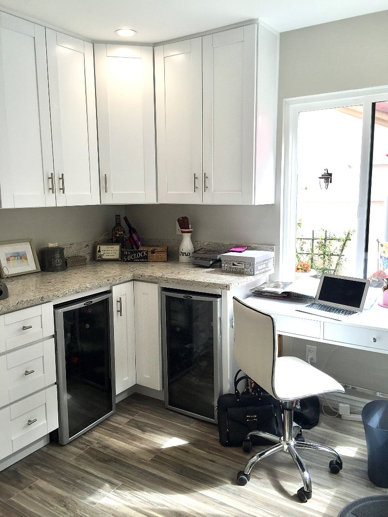 Wine and kitchen storage area 
Desk area in kitchen 