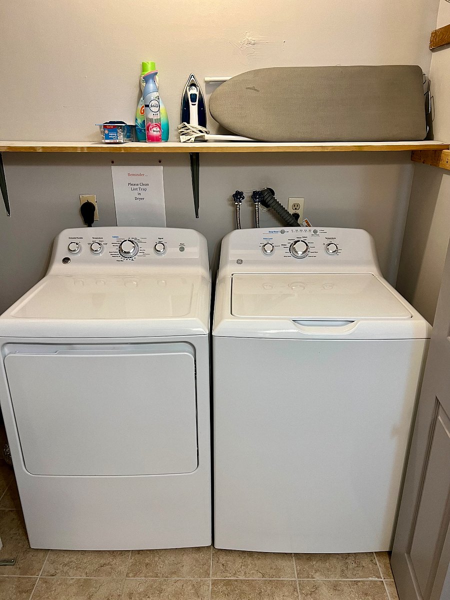Laundry Room-Brand new GE washer and dryer. Full size ironing board and iron.