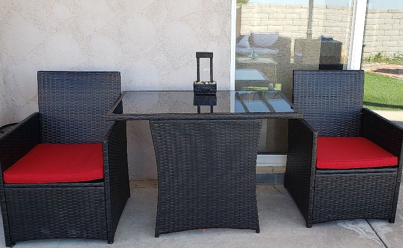 Covered, outdoor dinette set is the perfect place to enjoy early morning meals, casual lunches, and moonlit nightcaps!