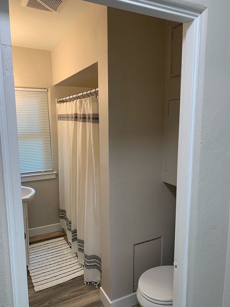 Bath with tub and shower encloser