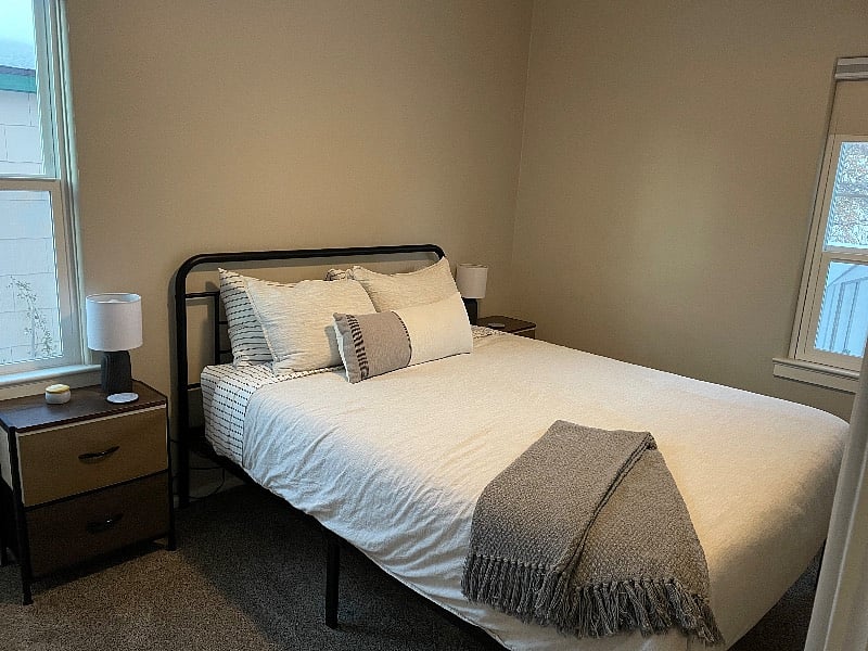 Bedroom 2 with queen size bed. Also with two windows with blackout shades.