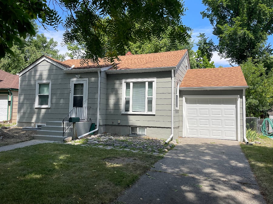 Main entrance to 2 bedroom home. Garage is allocated to basement unit, not this main home. Street parking in front of house for main home