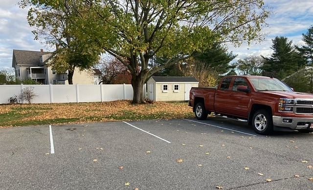 Designated Two Car Off-street Parking in rear with motion sensor  lighting.