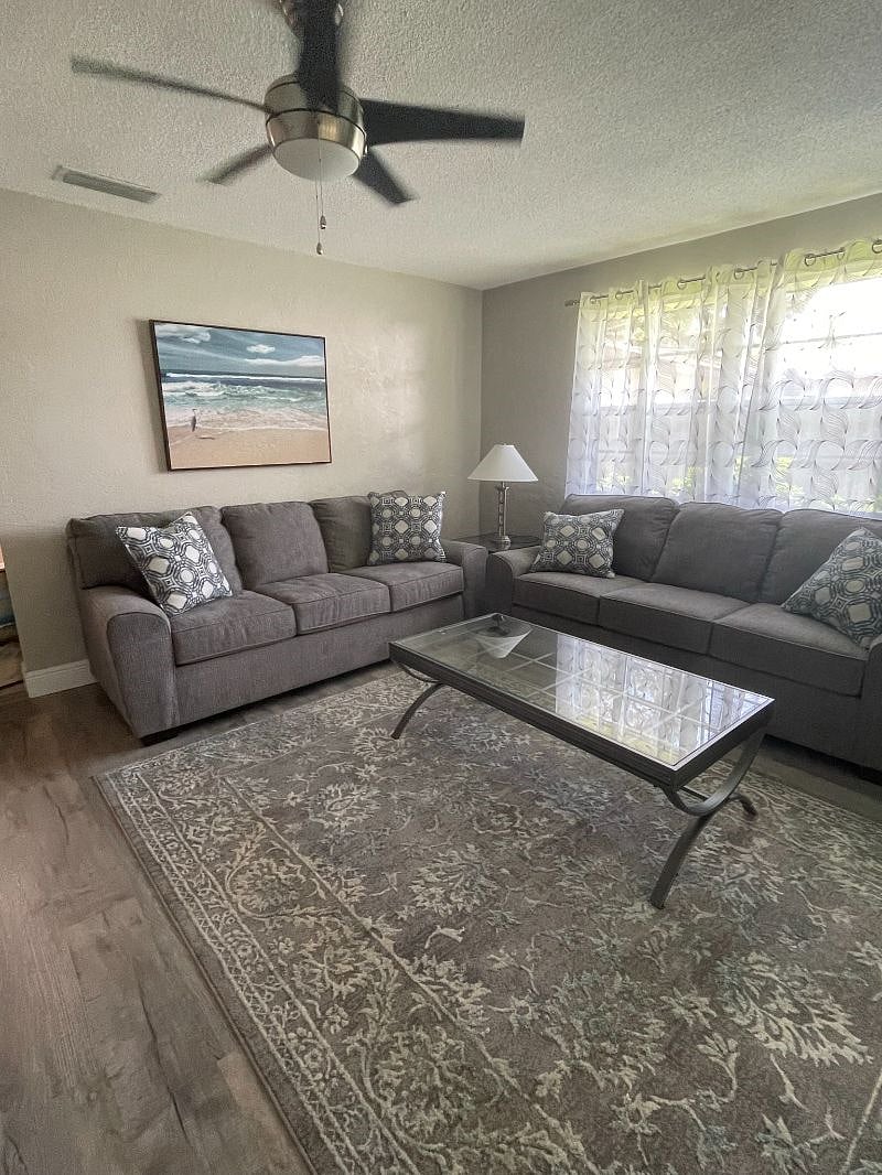 Very comfortable and spacious living area. Plenty of room for guests and entertainment. Big screen smart TV. Access to large covered porch.   
