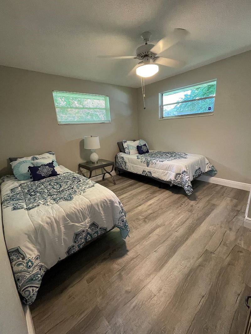 Additional guest room with 2 twin beds that can be converted to one king. Smart TV.
