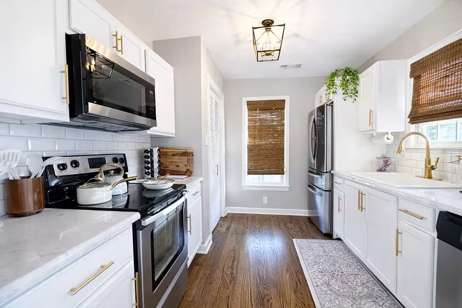 Fully equipped kitchen with full-size appliances, cookware, and everything needed to prepare meals during your stay.