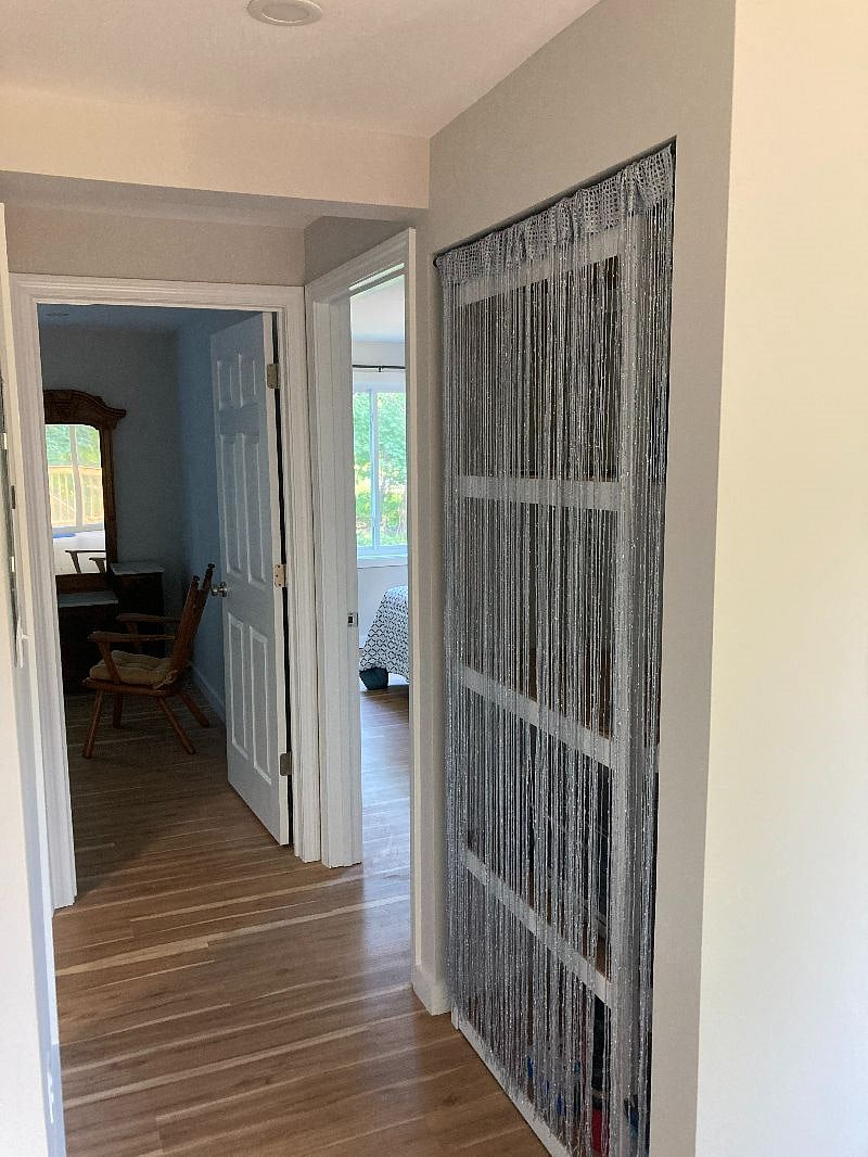 short hall-way to bathroom and bedrooms