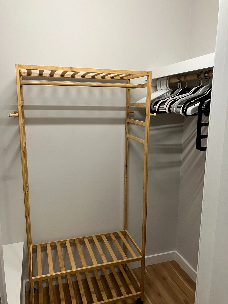 Walk-in closet in primary bedroom