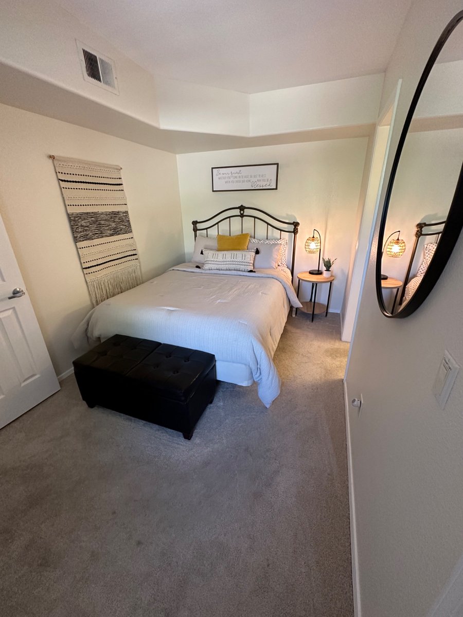 2nd bedroom with bed and closet.