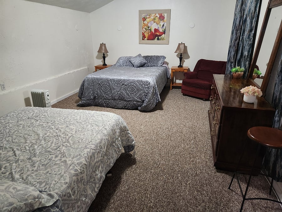 1st bedroom with queen- and full-size bed
