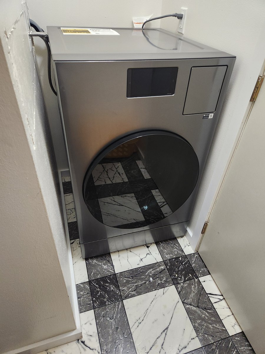 washer/dryer combo in the bathroom