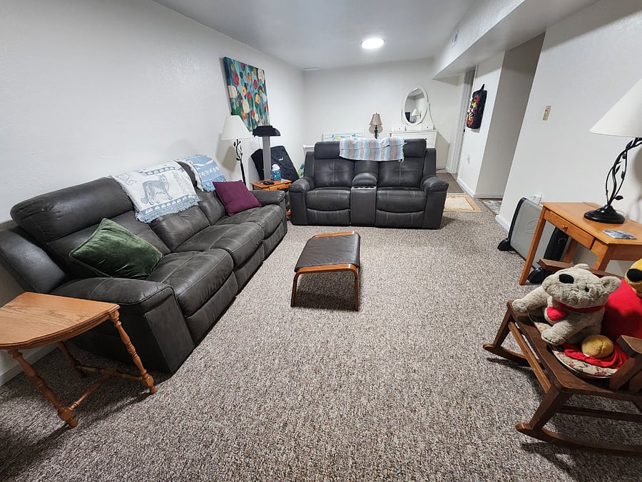 front room with recline couches
