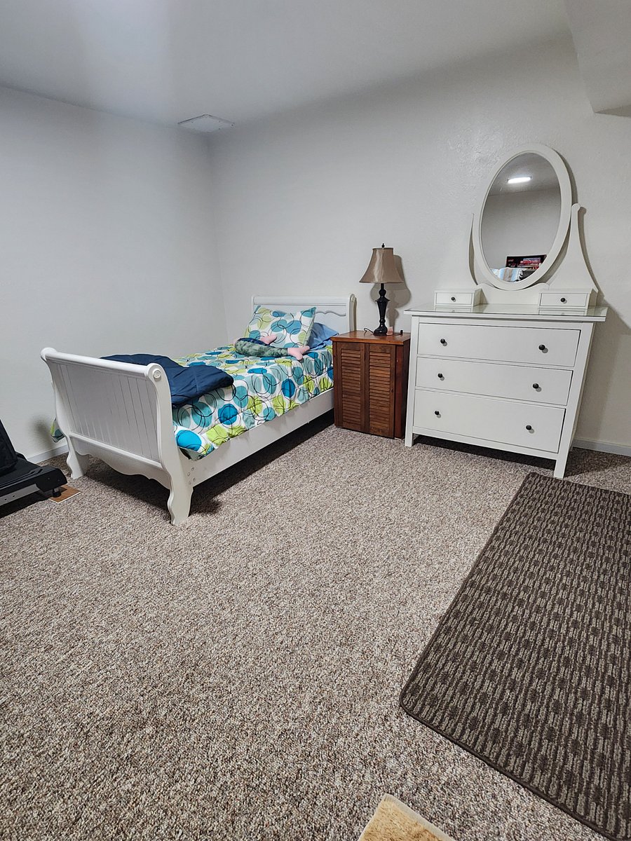 addition twin size bed in the front room.