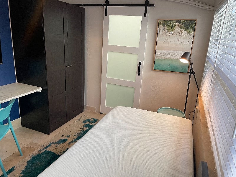 Twin bed, brand new memory foam mattress, bathroom door