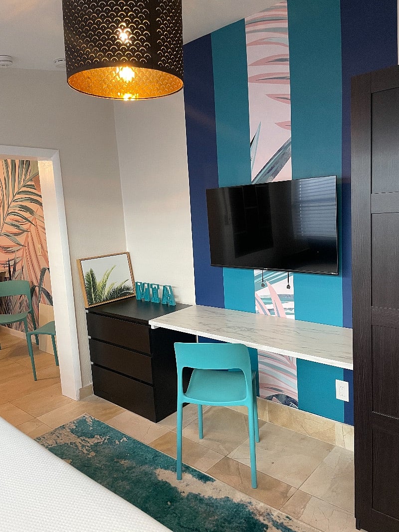 Dresser, desk, smart TV and armoire